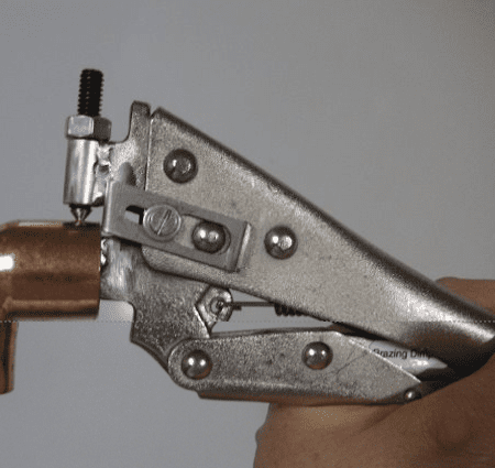 Man Holding Brazing Tool